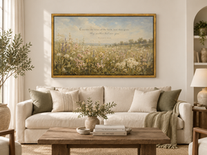Field of Grace framed wall art hanging above a sofa in a living room