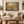 Gilded Autumn framed wall art hanging above a sofa in a living room