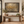 Gilded Autumn framed wall art in an entryway above a console table