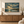 Harbor Light framed wall art hanging above a sofa in a living room