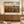 High Summer framed wall art hanging above a sofa in a living room