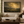 Into The Valley framed wall art in a dark wood frame above a living room sofa