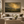 Into The Valley framed wall art in an antiqued gold frame in a neutral living room