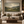 Olive Valley framed wall art in a black frame in a modern living room
