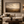 Pastures Beyond framed wall art in a dark wood frame above a living room sofa