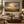 Prairie After the Storm framed wall art in a dark wood frame above a living room sofa
