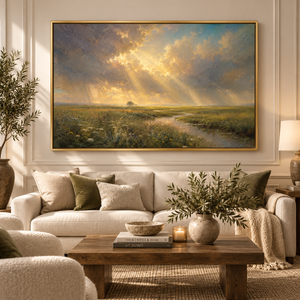 Prairie After the Storm framed wall art in an antiqued gold frame in a neutral living room