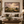 Rolling Country framed wall art in a dark wood frame above a living room sofa
