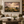 Rolling Country framed wall art in a black frame in a modern living room