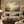 Sage & Still framed wall art in an antiqued gold frame in a neutral living room