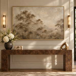 Softwood framed wall art in an entryway above a console table
