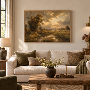 Still He Leads framed wall art hanging above a sofa in a living room