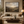 Stone Valley framed wall art in a dark wood frame above a living room sofa