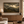Stormbreak framed wall art hanging above a sofa in a living room