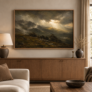 Stormbreak framed wall art hanging above a sofa in a living room