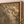 The Golden Leaves framed wall art in a natural oak frame in a living room