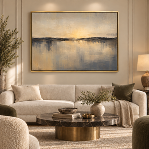 The Great Divide framed wall art in an antiqued gold frame in a neutral living room