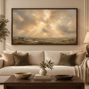 The Great Light framed wall art in a dark wood frame above a living room sofa