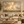 The Great Light framed wall art in an antiqued gold frame in a neutral living room