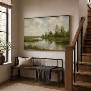 The Greenway framed wall art in an entryway above a console table