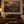 The Last Ember framed wall art hanging above a sofa in a living room
