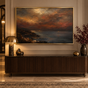 The Last Ember framed wall art in an entryway above a console table