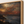 Close-up of the frame corner and canvas edge on The Last Ember