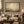 The Muted Way framed wall art in a dark wood frame above a living room sofa