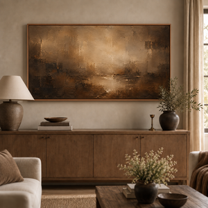 The Quiet Burn framed wall art hanging above a sofa in a living room