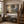 The Storm framed wall art in an entryway above a console table