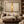 The Veil Torn framed wall art in a dark wood frame above a living room sofa