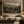 Through the Valley framed wall art in a black frame in a modern living room