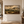 Weathered Hills framed wall art hung on an open gallery wall