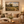 Wildflower Lane framed wall art hanging above a sofa in a living room