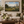 Wildflower Valley framed wall art in a dark wood frame above a living room sofa