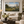 Wildflower Valley framed wall art in a black frame in a modern living room