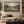 Wool Pastures framed wall art in a black frame in a modern living room